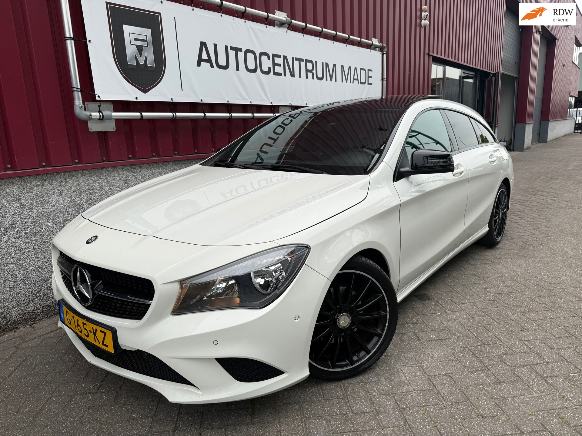 Mercedes-Benz CLA-klasse Shooting Brake 180 OrangeArt Edition // AMG Line // Automaat // Leer // Pano
