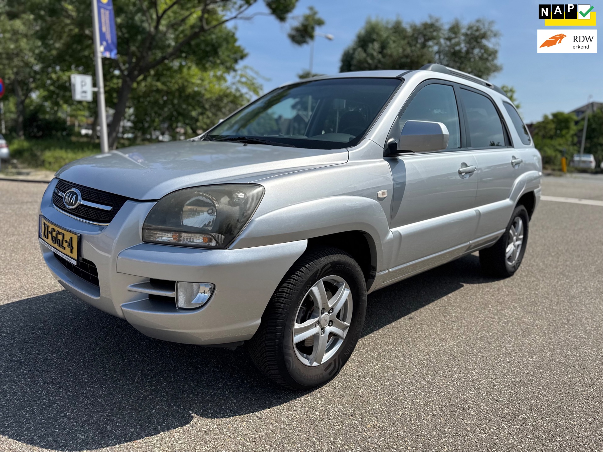 Kia Sportage 2.0 CVVT Comfort / airco / cruise.control / elek.ramen / deurvergrendeling / lmv / trekhaak / nap….