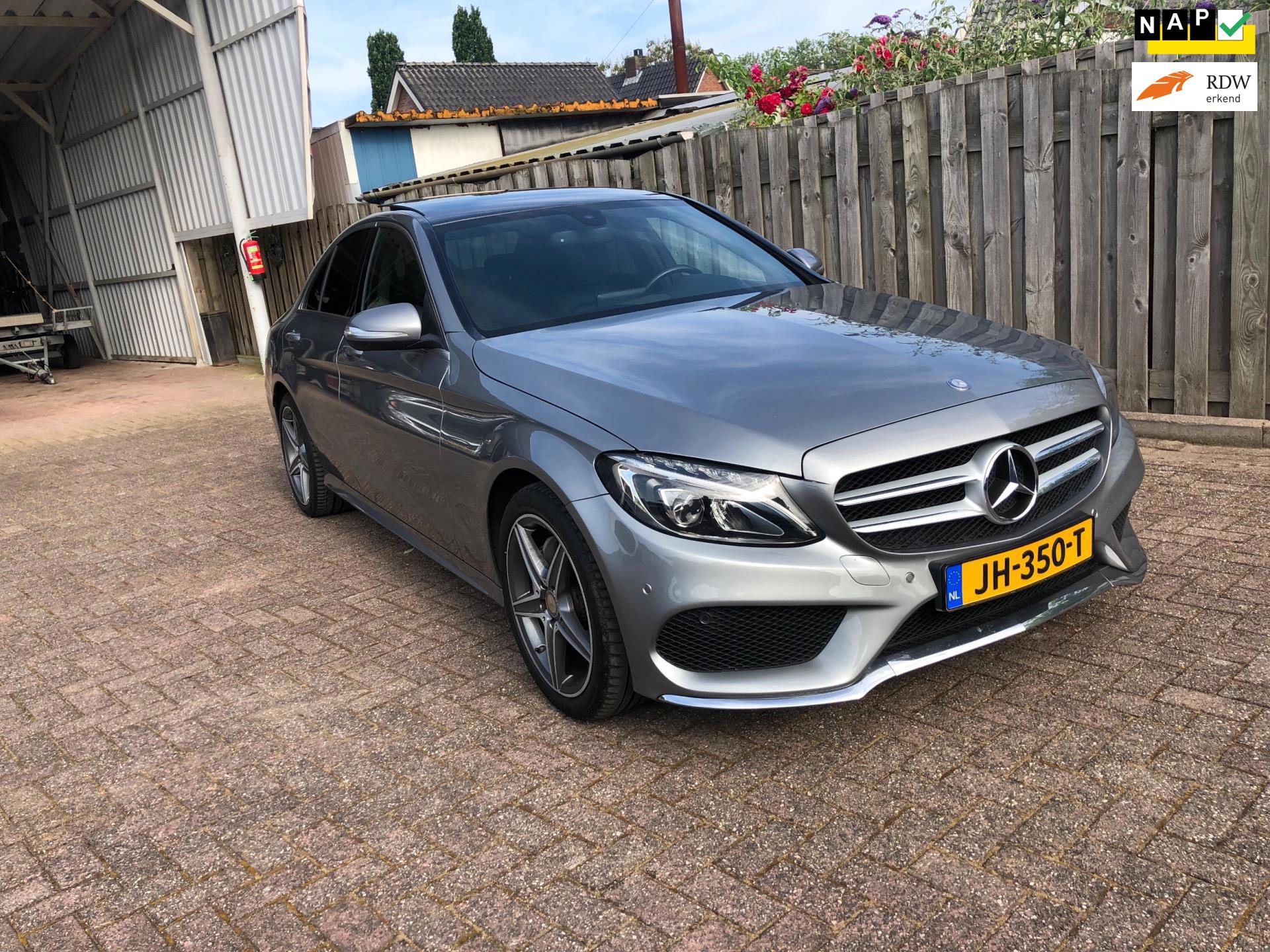 Mercedes-Benz C-klasse 180 AMG Panoramadak Navi Leer Camera