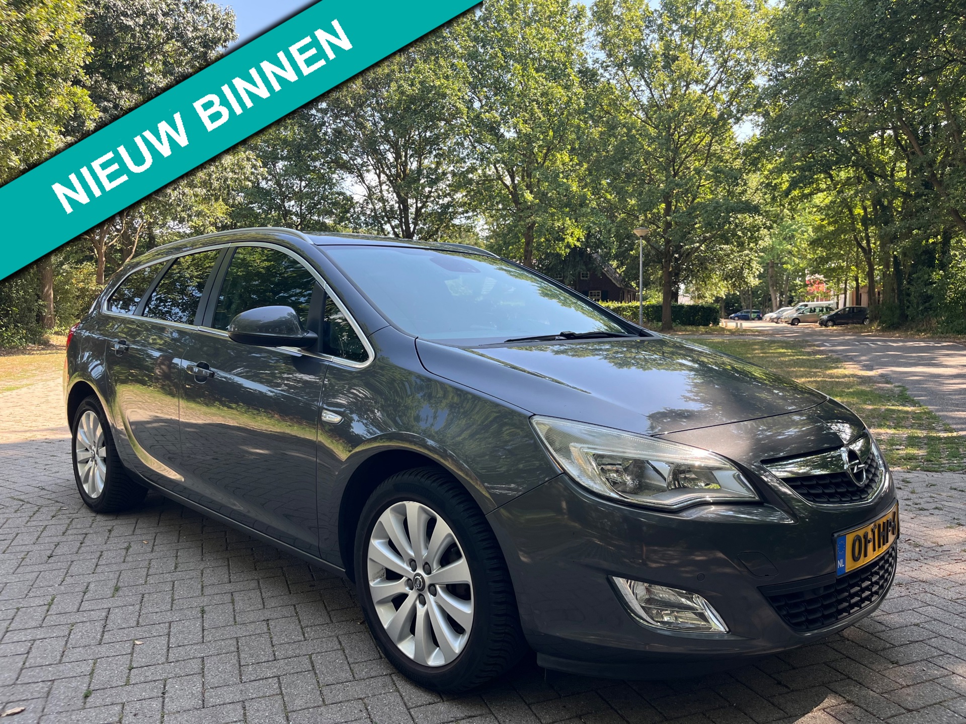 Opel Astra Sports Tourer 1.4 Turbo Cosmo 2012 NIEUWE APK