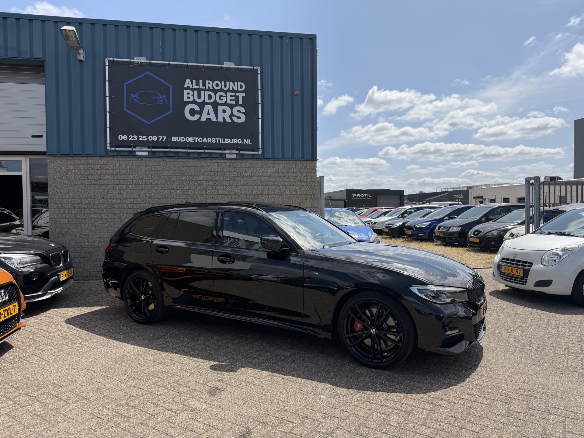 BMW 3-serie Touring 330e High Executive