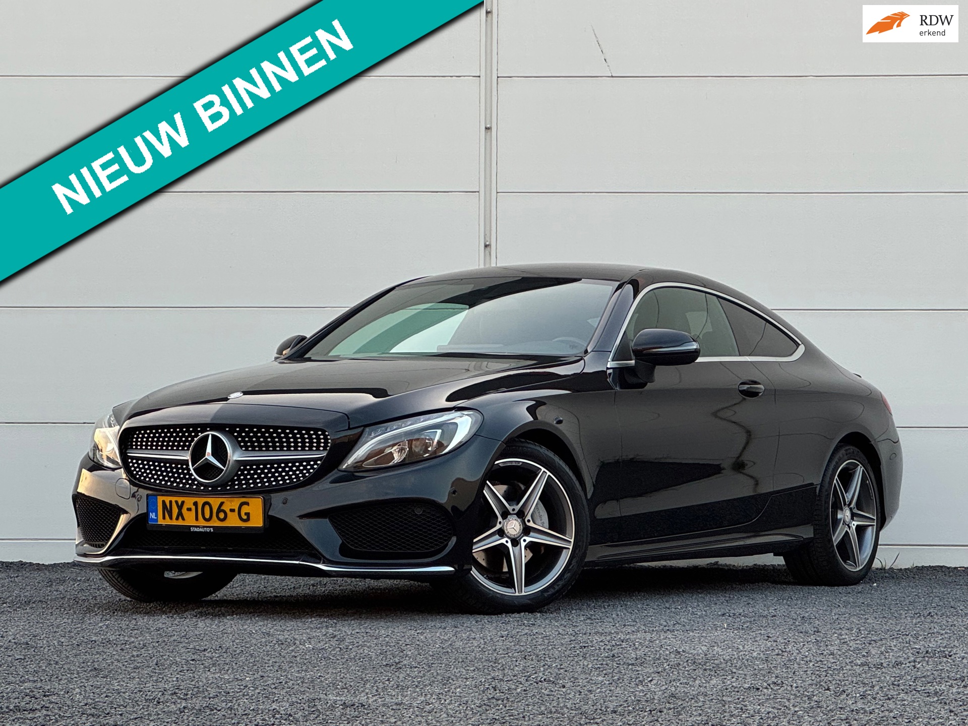 Mercedes-Benz C-klasse Coupé 180 Amg Burmester Groot scherm Camera AMG diffuser Apple Sportonderstel Sportstoelen Stoelverwarming.