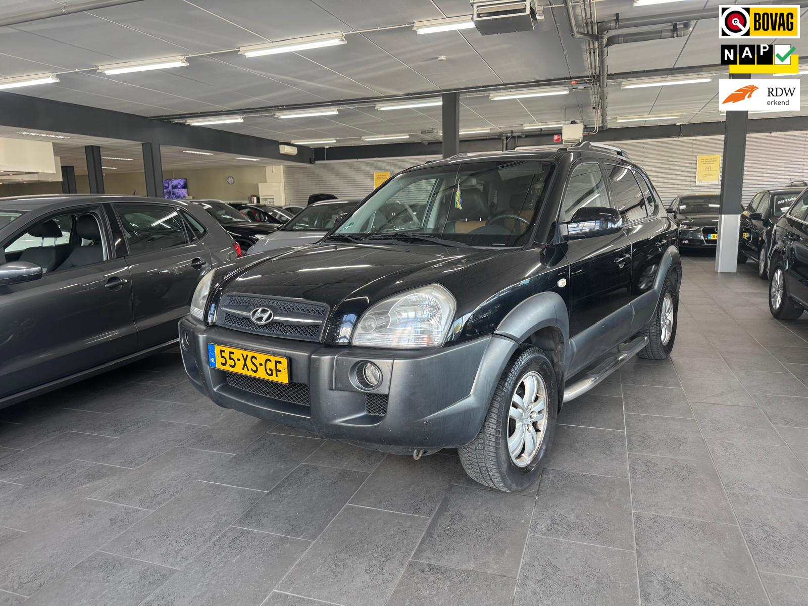 Hyundai Tucson 2.0i Style Premium LPG g3 leer clima cruise controle lm-velgen elektrische pakket zijbar trekhaak parkeersensoren