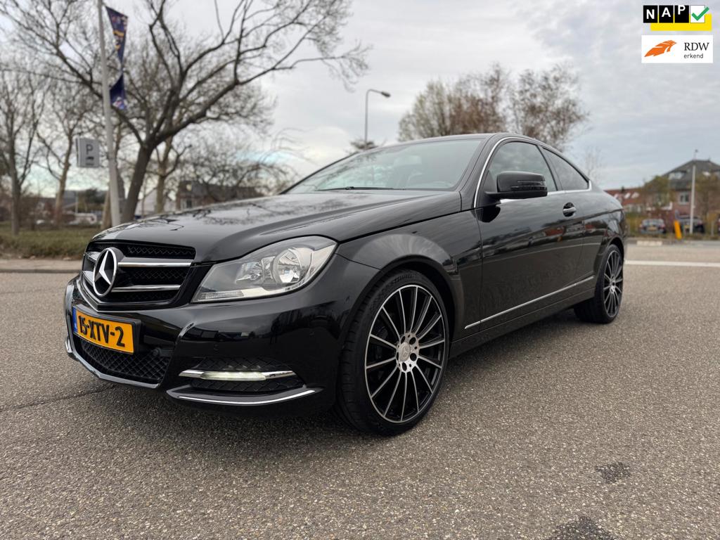 Mercedes-Benz C-klasse Coupé 180 Ambition / airco / cruise.control / leder / pdc / elek.pakket / lmv / nap....