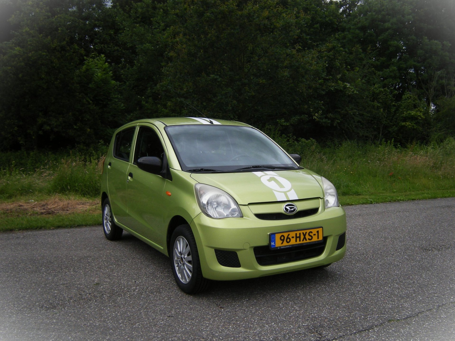 Daihatsu Cuore 1.0 Trend . 5 Deurs . Lichtmetalen velgen . Centrale deurvergrendeling . Audio . enz