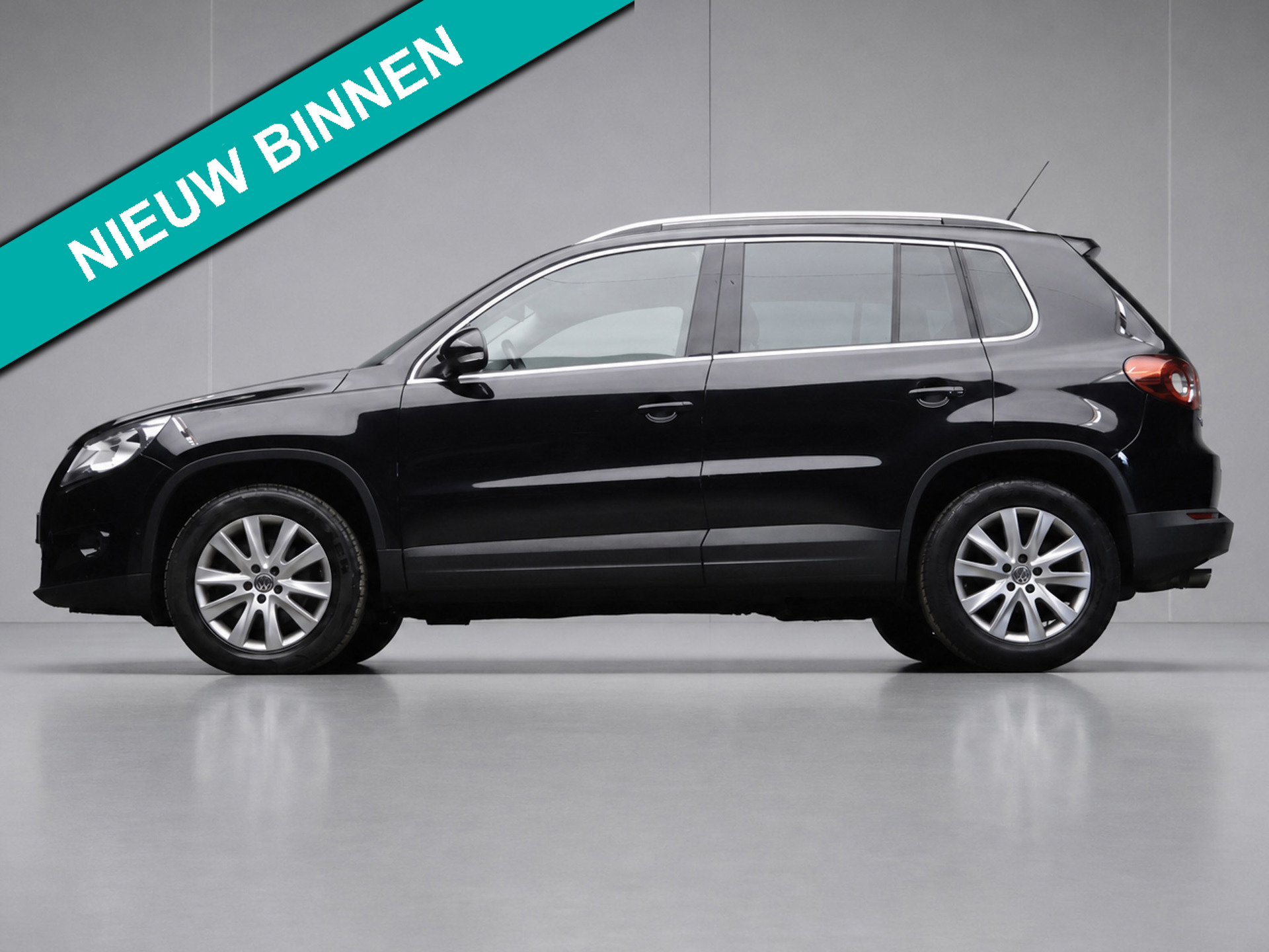 Volkswagen Tiguan 2.0 TSI Sport&Style 4Motion (NAVI,LED,CRUISE,SPORTSTOELEN,PDC,CLIMATE,LM VELGEN,GETINT,NETTESTAAT)