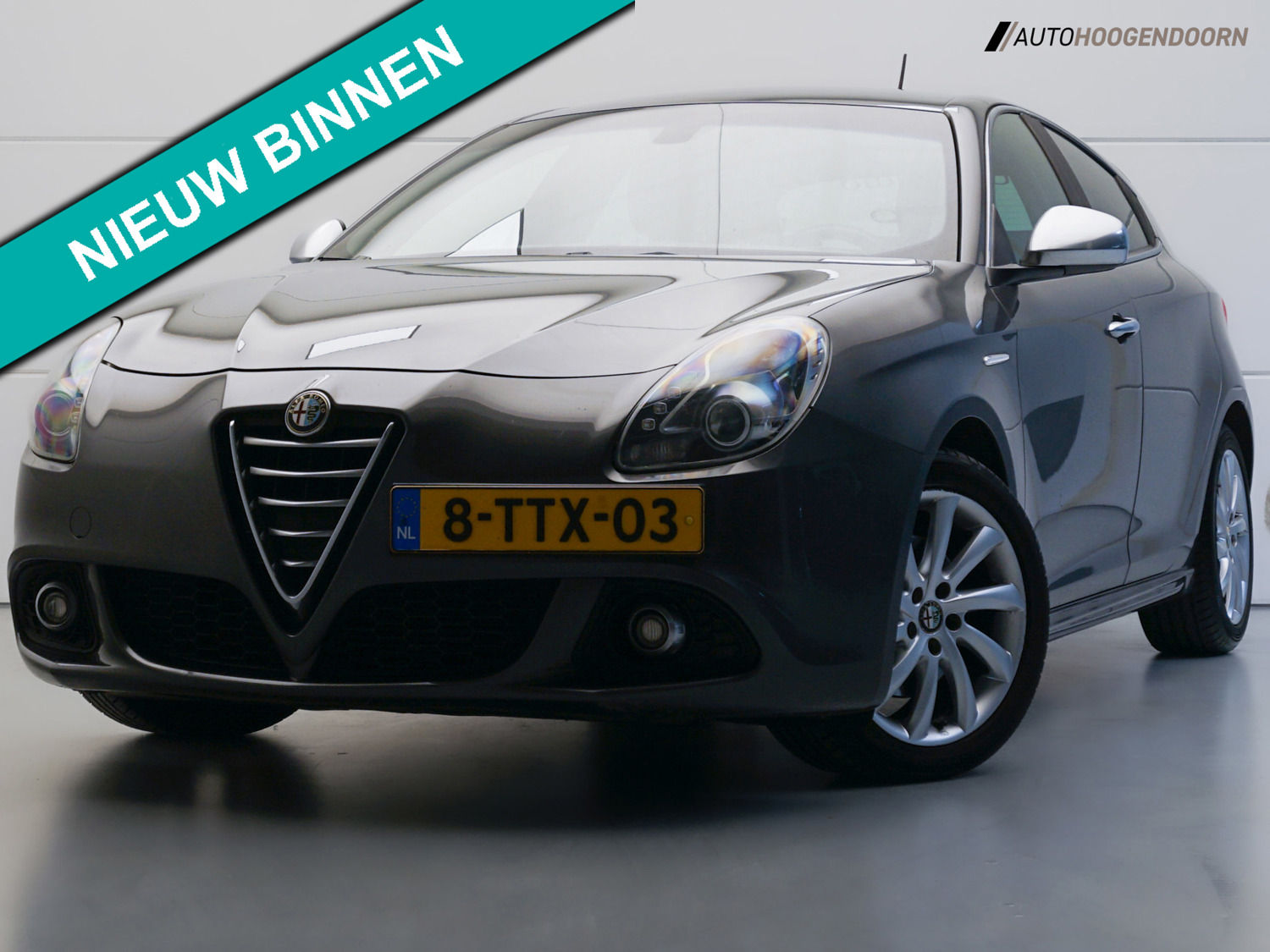 Alfa Romeo Giulietta 1.4 T Exclusive Sport (AUTOMAAT,PARKEERSENSOREN,CLIMATE,CRUISE,BLUETOOTH,NAVIGATIE,LM-VELGEN,TOPCONDITIE)