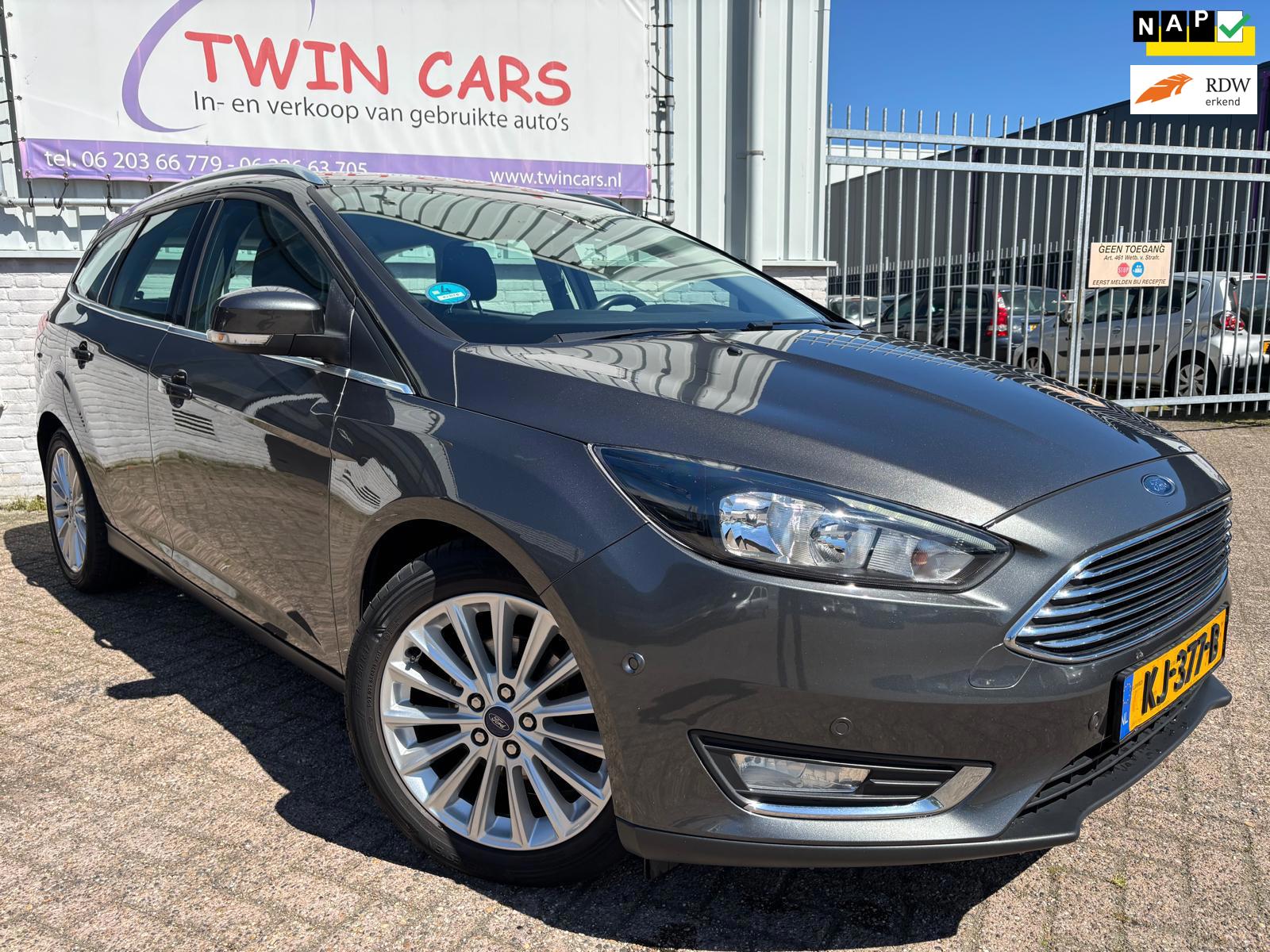 Ford Focus Wagon 1.0 Titanium AIRCO/NAVI/CRUISE/LMT VELGEN/ELEK. RAAM