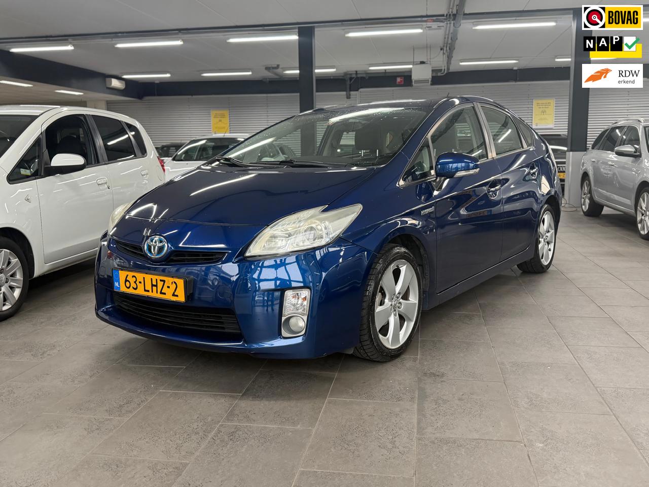 Toyota Prius 1.8 Aspiration 1-eigenaar clima cruise control lm-velgen elektr-pakket parkeersensoren trekhaak volledig onderhouden