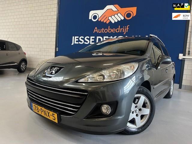 Peugeot 207 SW 1.4 VTi Style Stationwagen/bj.2011/ kleur:grijs/airco/trekhaak/cruise control/NAP met 239278 km.en APK tot 09/2026.