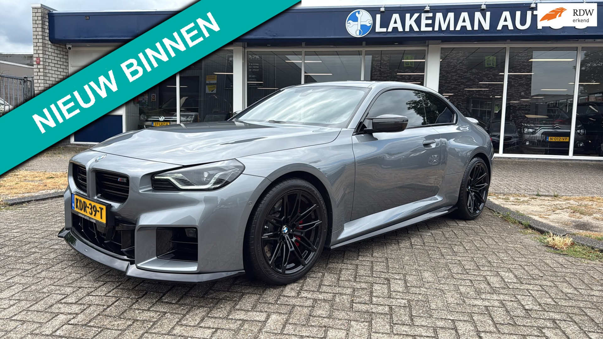 BMW M2 G87 | Schuifdak | Camera | Head up | HK | Sportstoelen | Carbon pakket | Fabrieksgar. | 1e eig