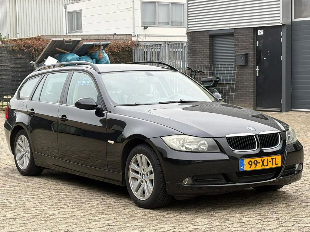BMW 3-serie Touring 318i Business Line Navigatie airco NAP Lederen bekleding APK Automaat
