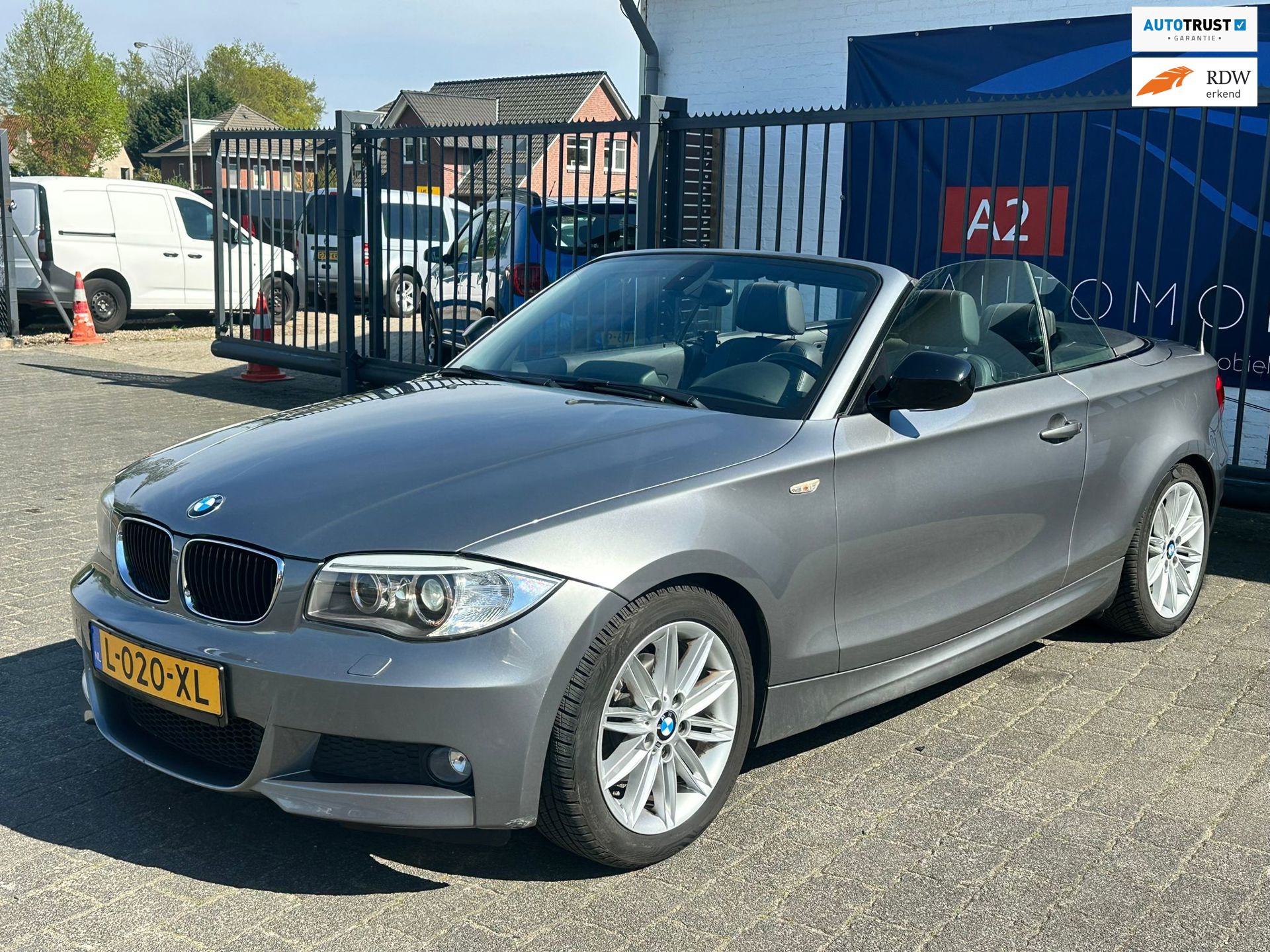 BMW 1-serie Cabrio 118i High Executive / STOELVERWARMING / CRUISE CONTROL / NAVIGATIE / AIRCO