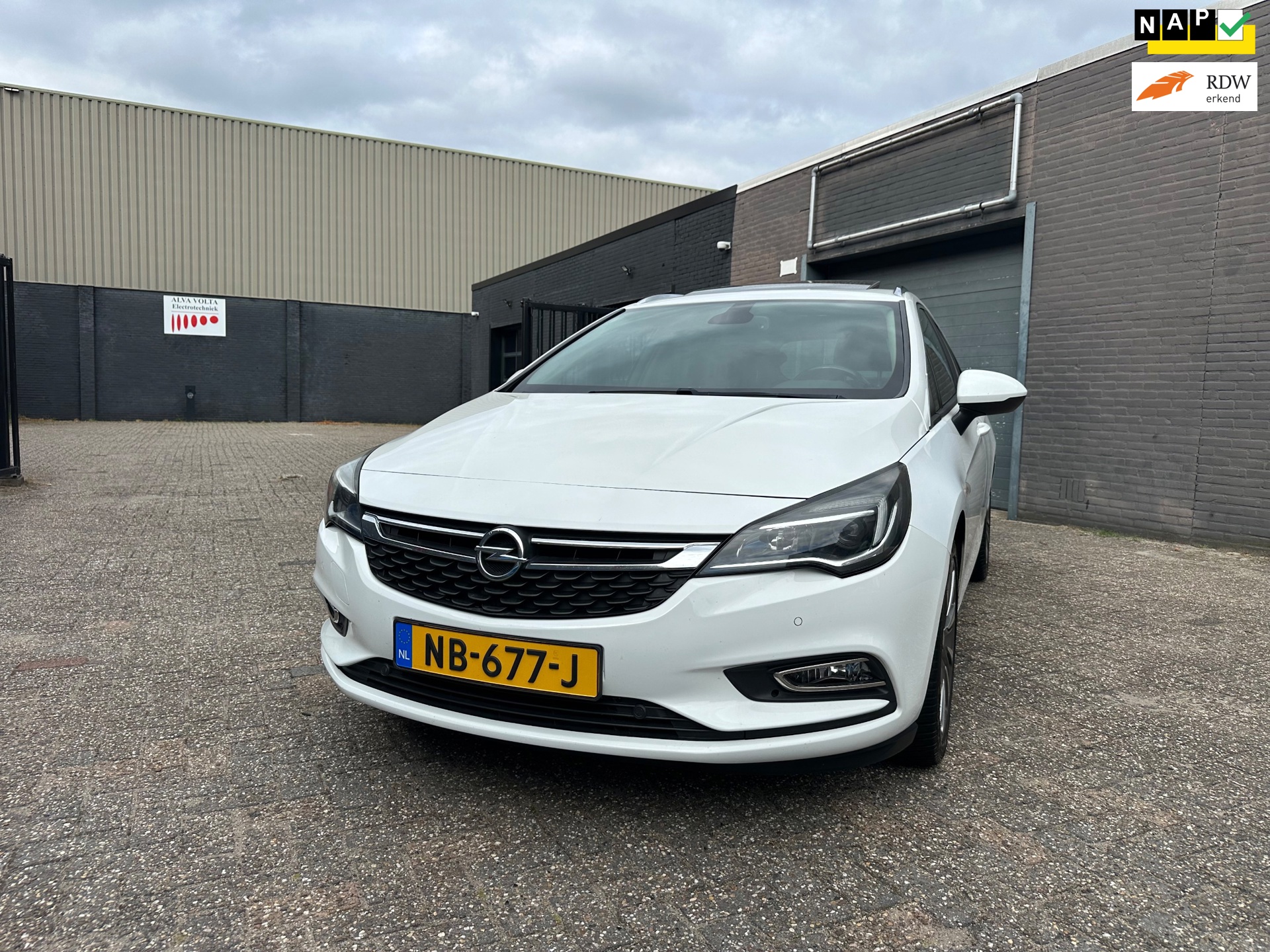 Opel Astra Sports Tourer 1.4 Business+ Clima Cruise Navi Dak Led PDC LM-Wielen APK NAP.