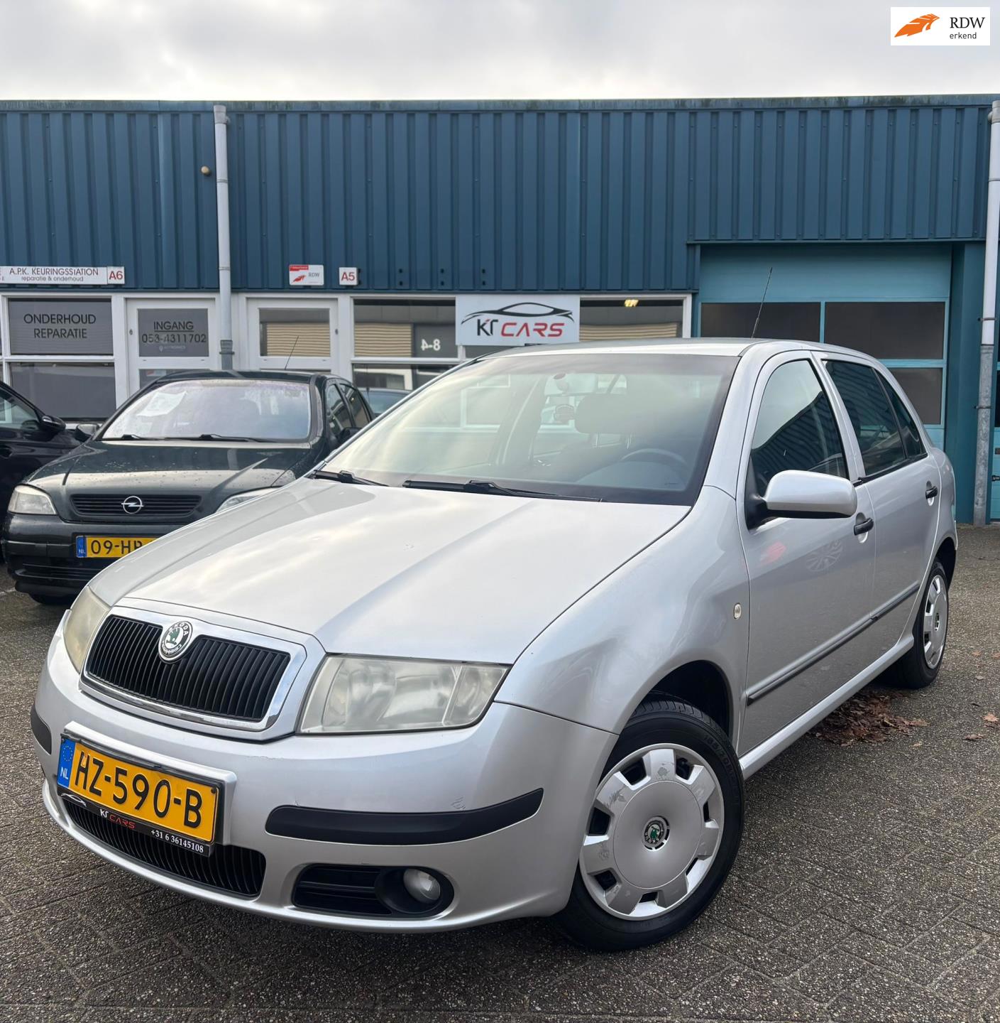 Skoda Fabia 1.4-16V Elegance | APK | Stoelverwarming | Airco | Parkeersensoren | EL Ramen | Nieuwe Koppeling |