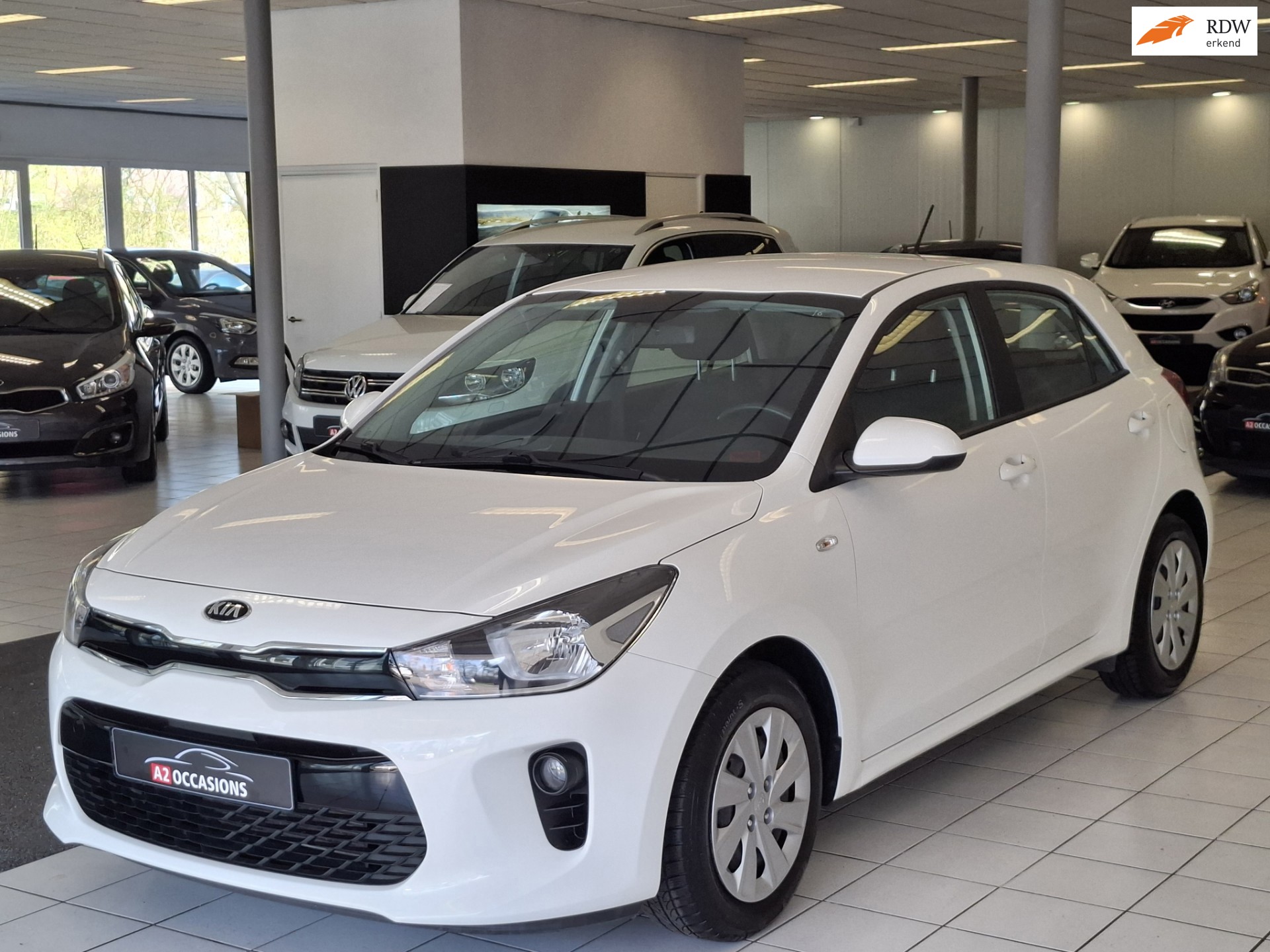 Kia Rio 1.2(4 cil) Bluetooth/PDC/Cruise/Stoel+Stuuverw/All Season