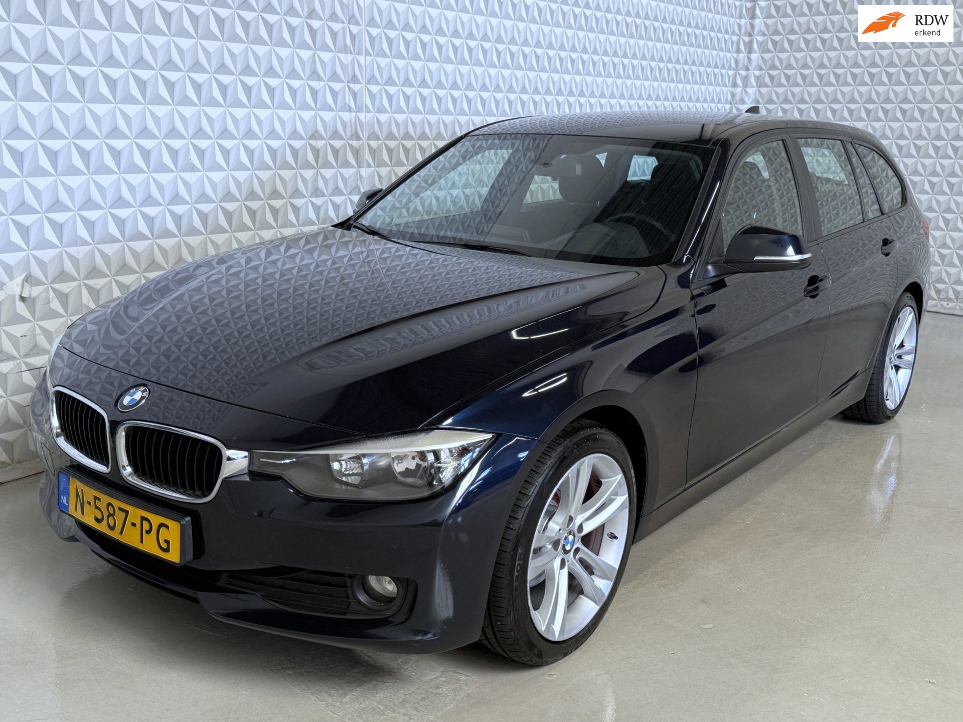 BMW 3-serie Touring 316i Airco Cruise Navigatie (2013)