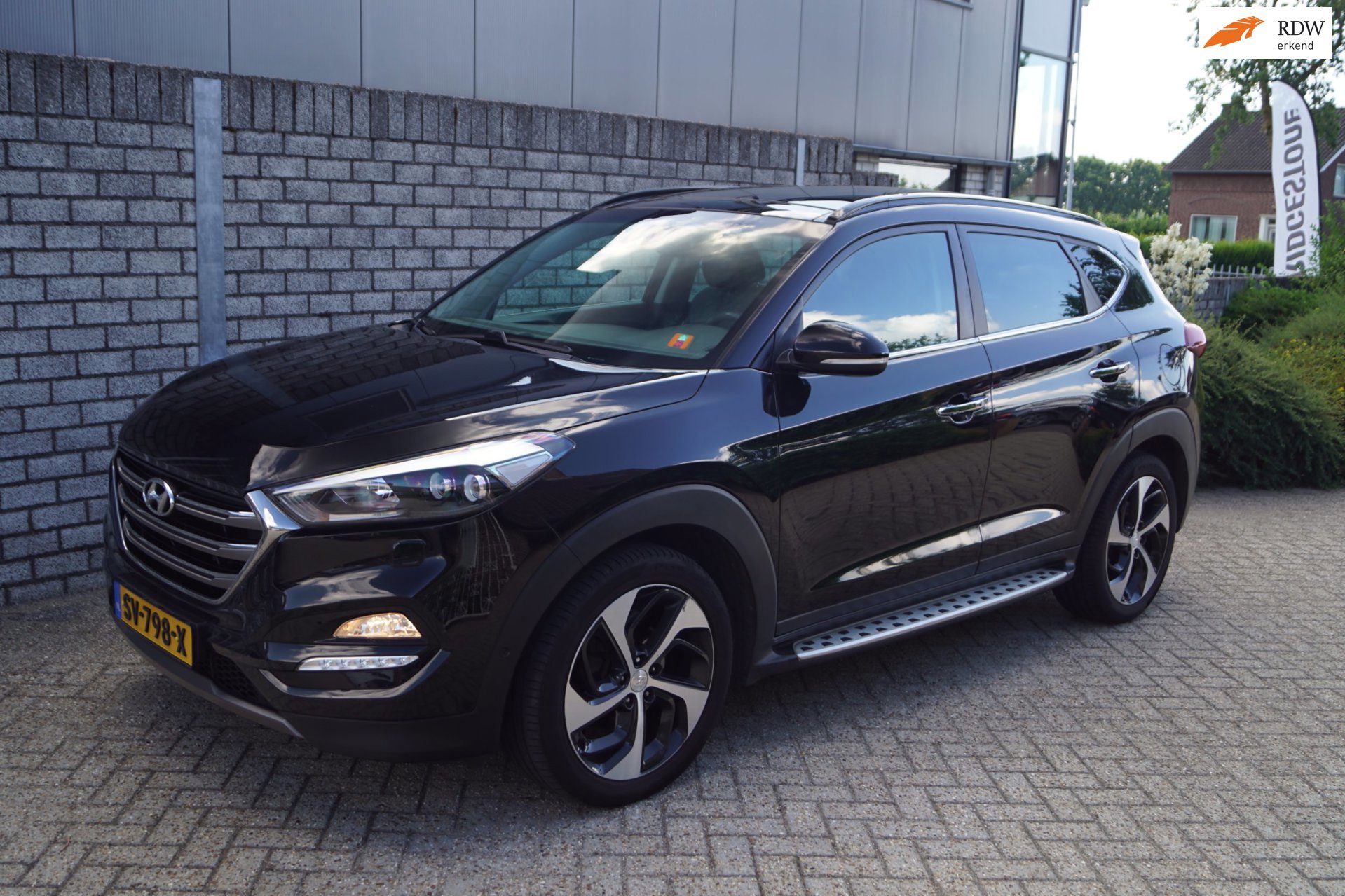 Hyundai Tucson 1.6 T-GDi Premium 4WD Autom Panodak Leder Sportst Stoel/Stuur A Bank Verw Navi Camera Clima Cruise 2x PDC LMV Trekh