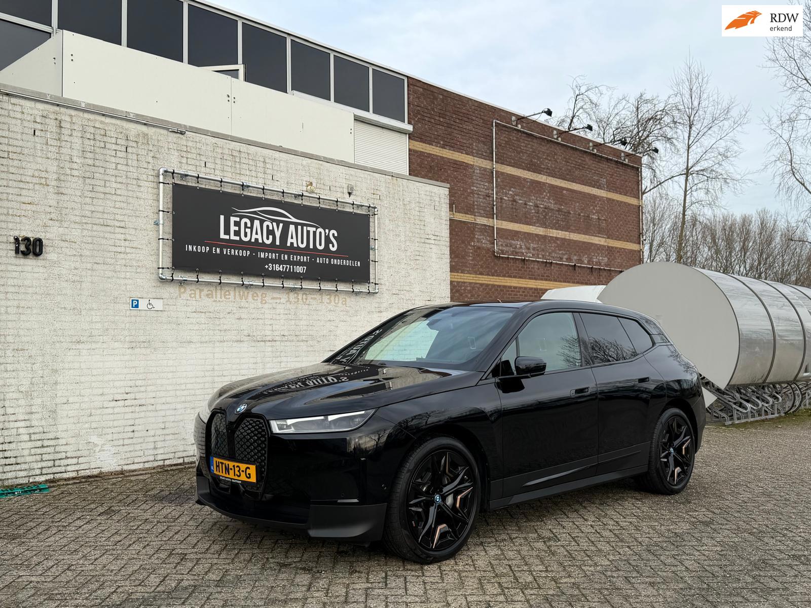 BMW IX xDrive50 High Executive 112 kWh -ZEER LAGE KM - PANO - HARMAN KARDON - H/U DISPLAY - VOL OPTIES -
