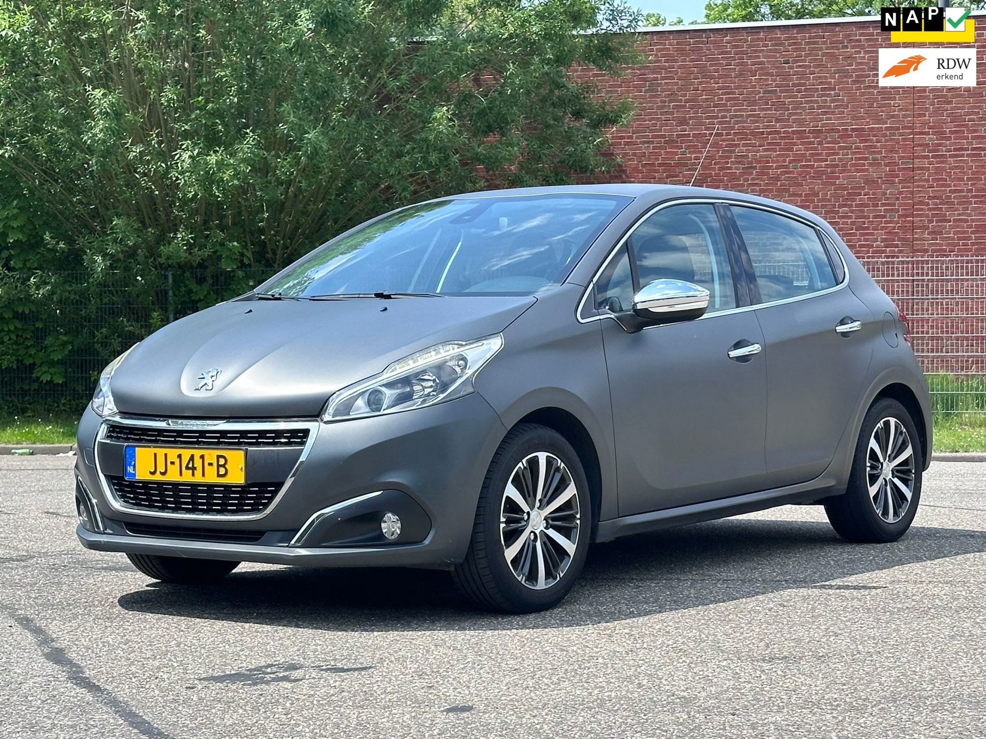 Peugeot 208 1.2 PureTech Allure Navigatie*Half leder*Distributie vervangen*Dealer onderhouden*Cruise*Clima*NAP*LM velgen*