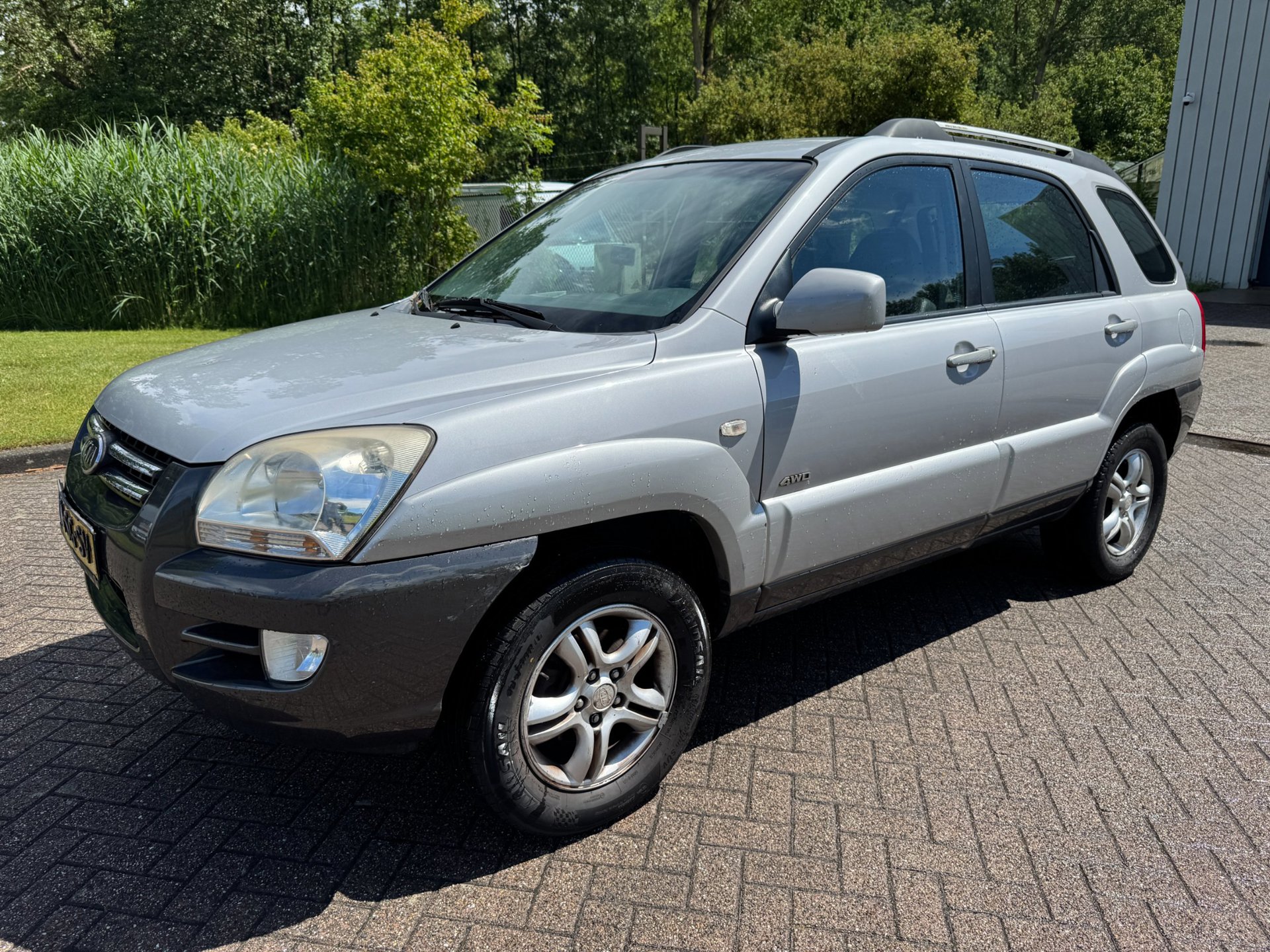 Kia Sportage 2.0 CVVT Comfort AIRCO PARKEERSENSOR ACHTER NIEUWE APK/HALFLEDER