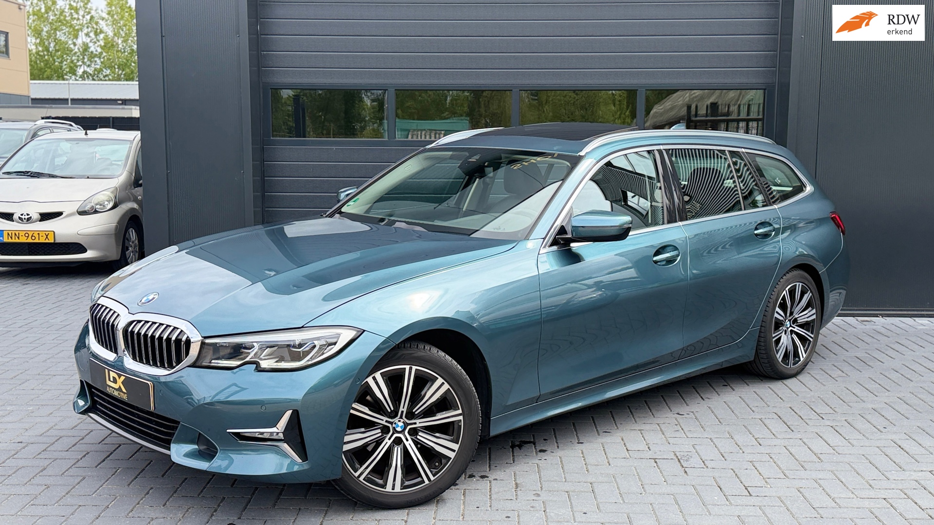 BMW 3-serie Touring 320i High Executive|trekhaak|Pano|