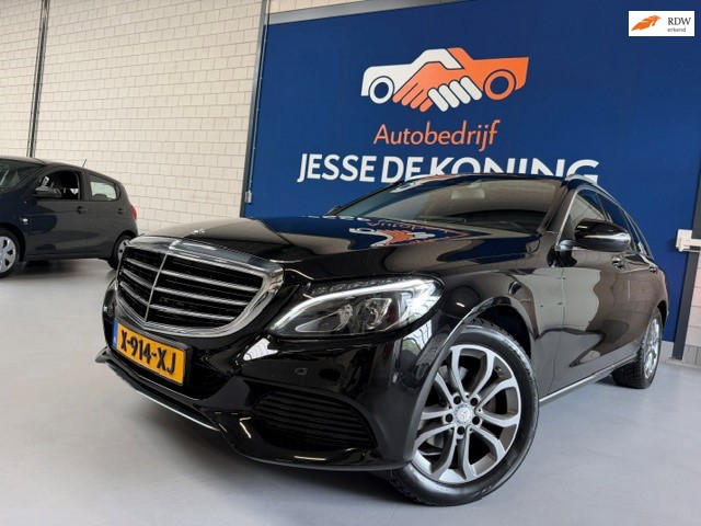 Mercedes-Benz C-klasse Estate 180 Prestige automaat / bj.2015/ navigatie/scherm/trekhaak/half leder/NAP met 210652 km./ APK 03/27.