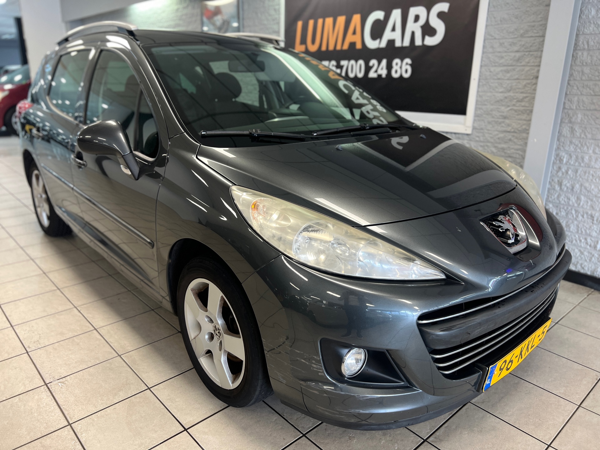 Peugeot 207 SW 1.6 VTi Première | Pano | cruise | Navi |