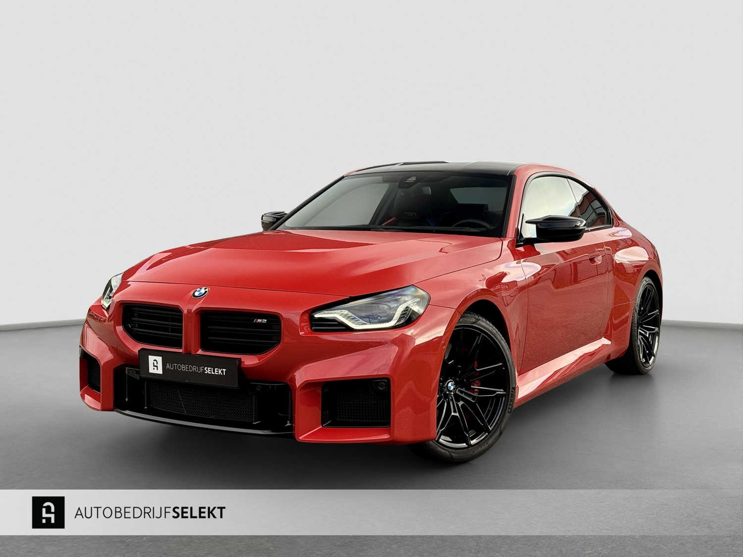 BMW 2-serie Coupé M2 | G87 | Toronto rood metallic | Carbon dak | Memory