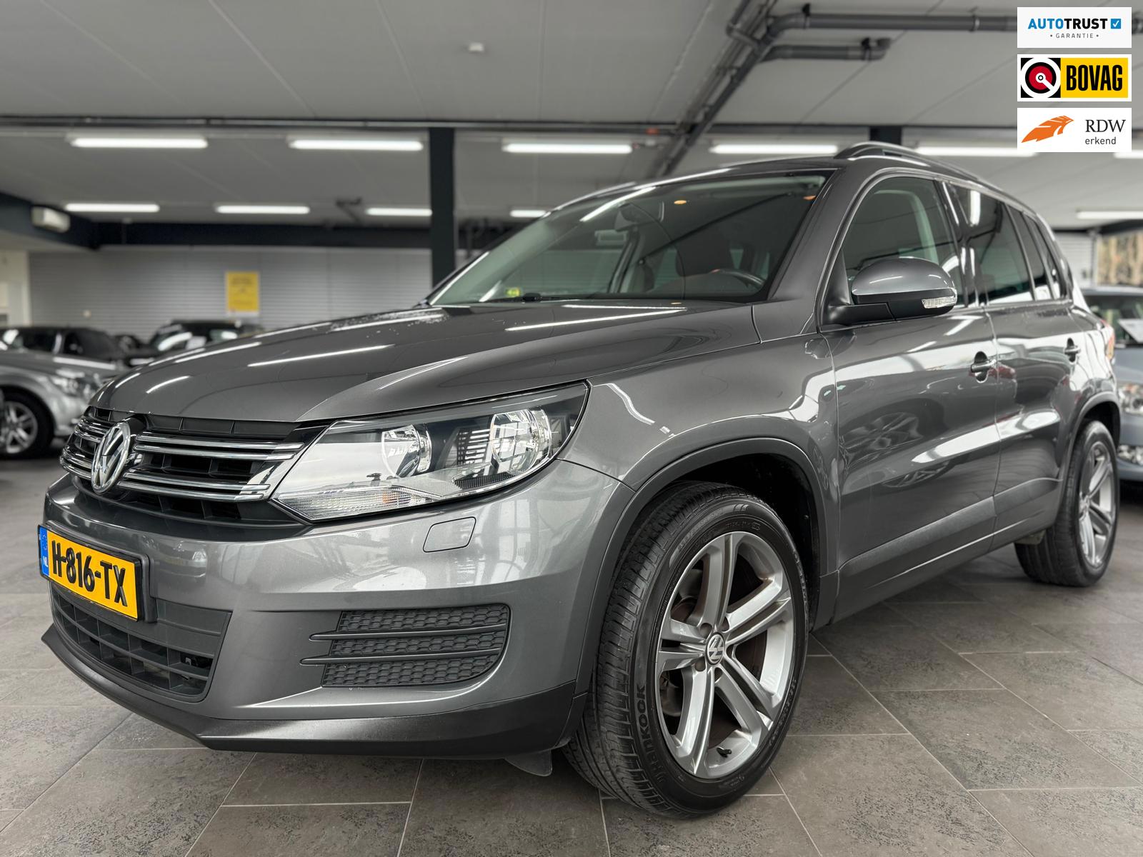 Volkswagen Tiguan 1.4 TSI Sport&Style navi clima cruise controle lm-velgen parkeersensoren stoelverwarming trekhaak