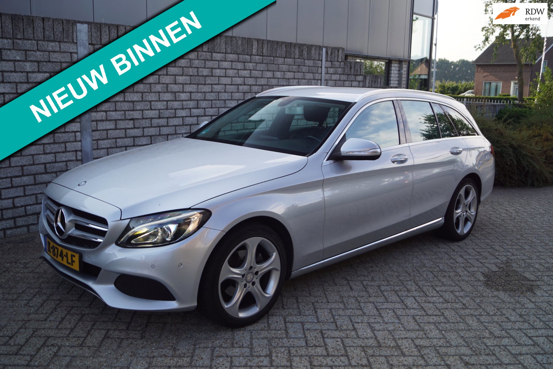 Mercedes-Benz C-klasse Estate 180 Ambition Autom Half Leder/Stof Sportst Stoelverw Navi Clima Cruise LED Kopl 2x PDC LMV 18 Trekh