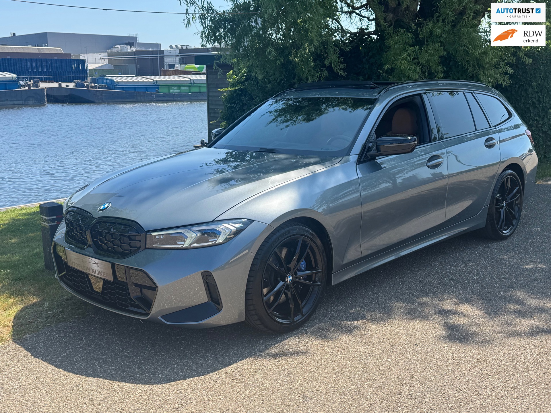 BMW 3-serie Touring 330i xDrive M Sport Laser Panodak Memory HuD VOL!