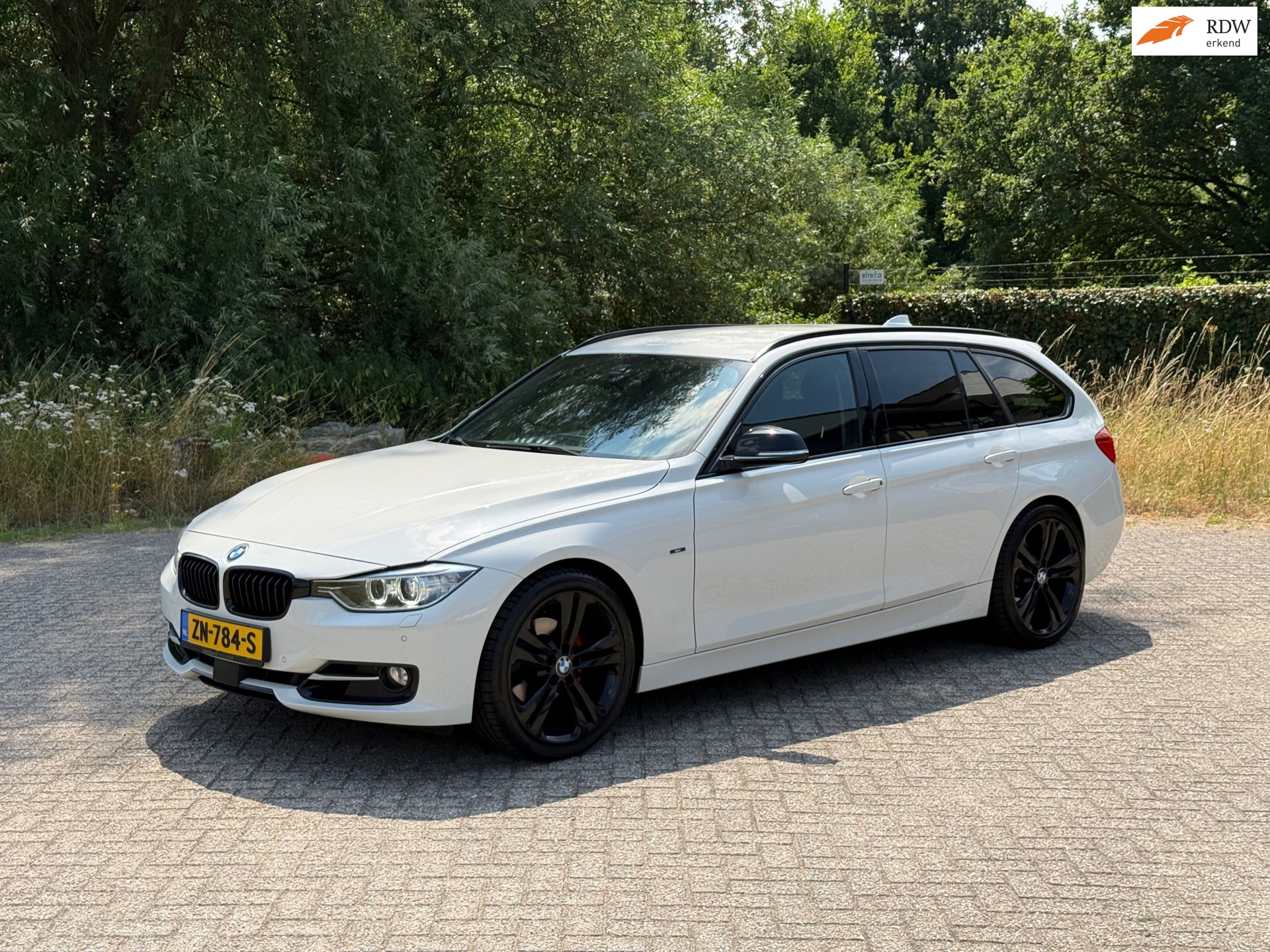 BMW 3-serie Touring 320i High Executive AUTOMAAT I LED I NAVI I VOLL ONDERHOUD