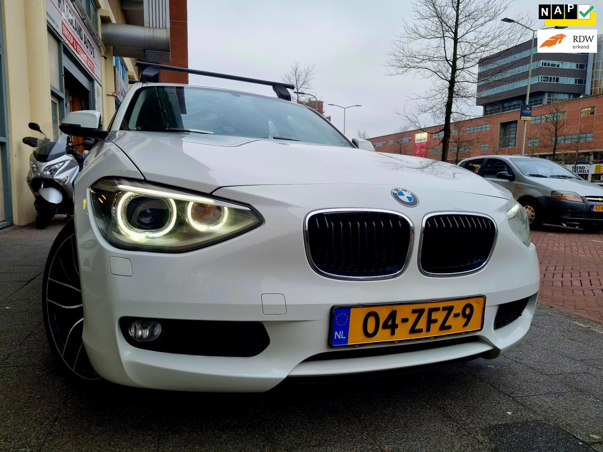BMW 1-serie 114i Business+ Navi Airco ElecRam xenon