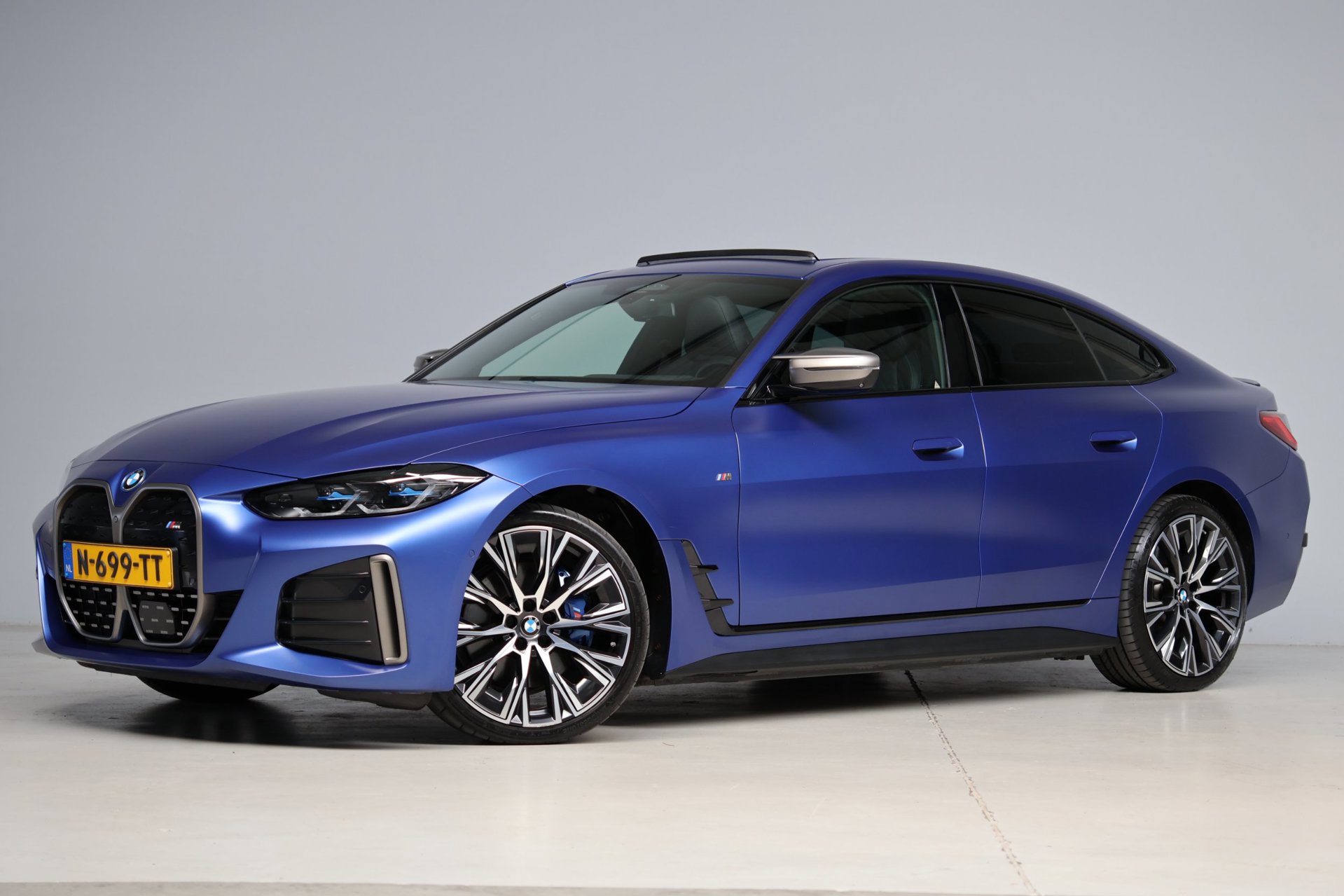 BMW I4 M50 High Executive M-sport | schuifkanteldak | m-sport seats | individual frozen | adap. cruise | carbon | harmankardon