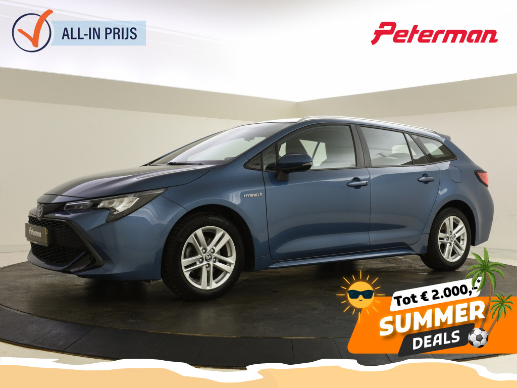 Toyota Corolla Touring Sports 1.8 Hybrid Active | Trekhaak | Adapt. cruise | Carplay/Androida.