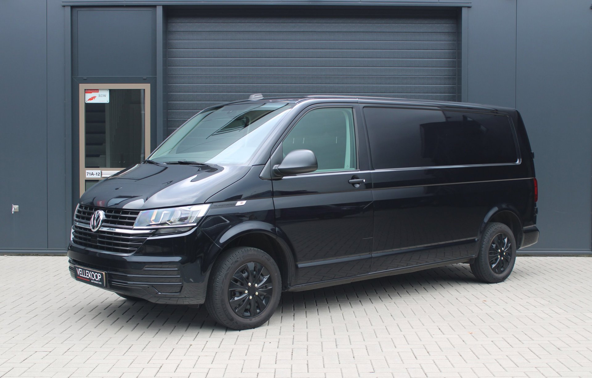 Volkswagen TRANSPORTER 2.0 TDI L2H1 28 Economy Business | Fabrieksgarantie | Trekhaak | Cruise Control | Airco | PDC | Carplay