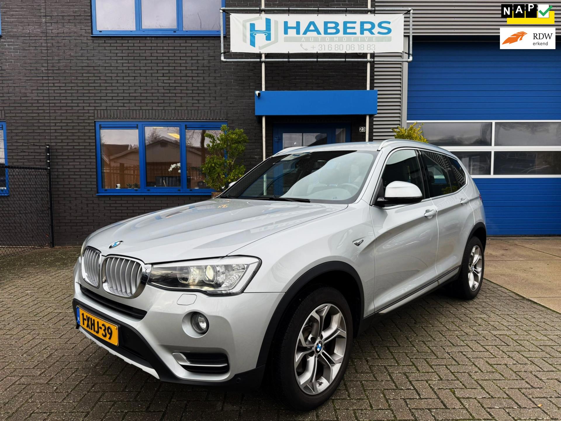 BMW X3 XDrive20i High Executive 184PK|Origineel NL|Proff Navi|AUT|4x4|Trekhaak|Leder|Sportstoelen|Xenon|StoelVW|Climate|Cruise|PDC