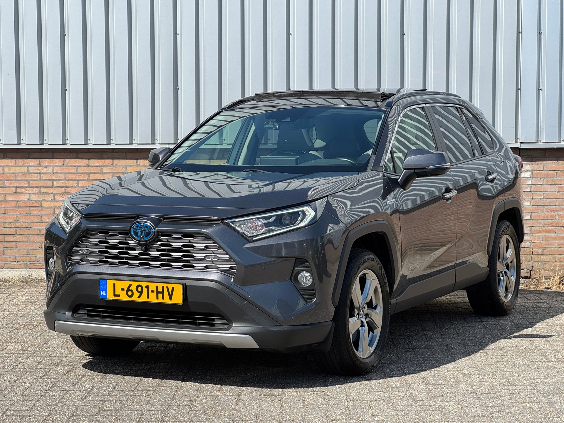 Toyota RAV4 2.5 Hybrid AWD Executive Panorama/ Leder/ Trekhaak