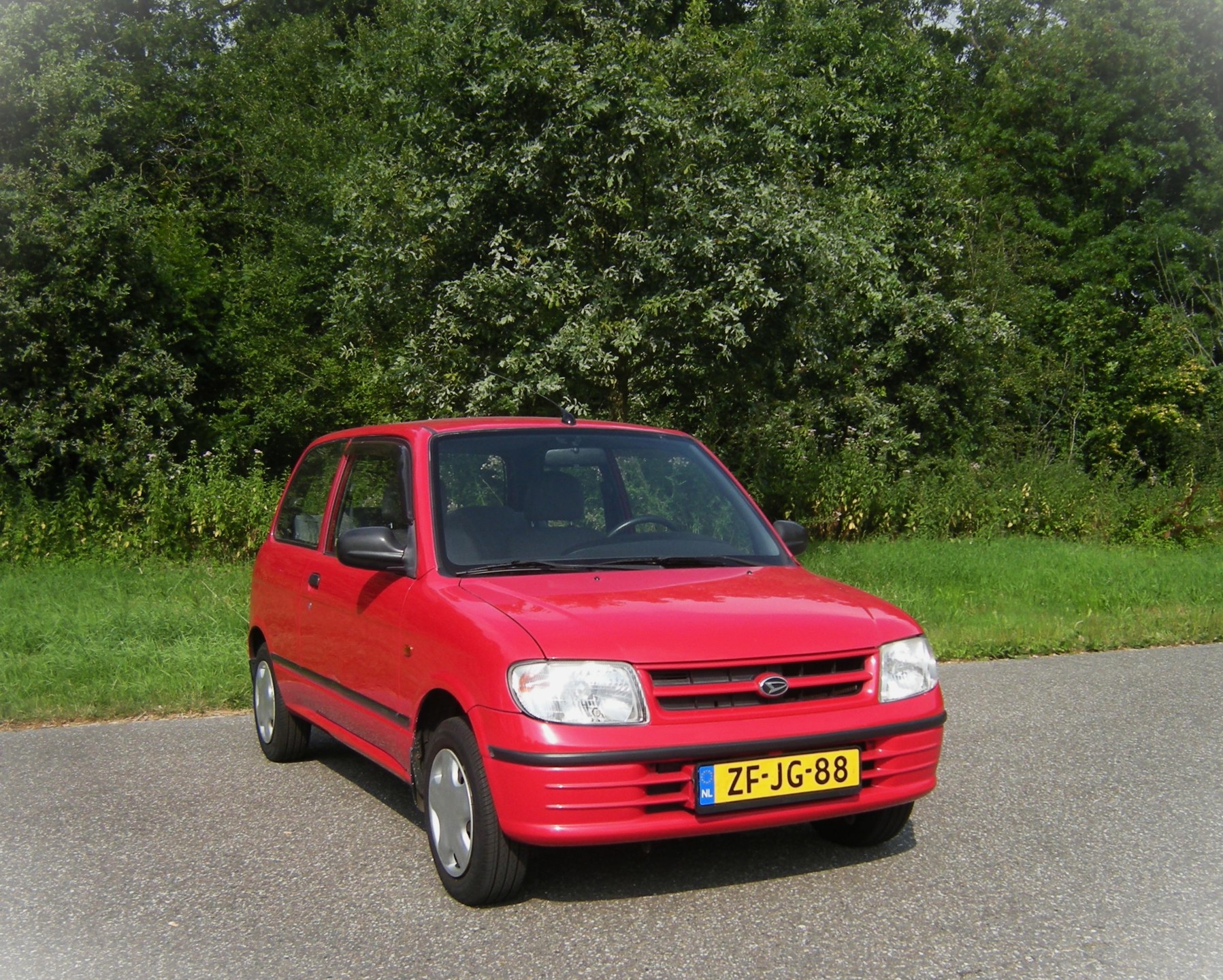 Daihatsu Cuore 1.0-12V RTi . 3 Drs . AUTOMAAT . PDC achterzijde . Elec ramen en spiegels . Centrale deurvergrendeling . enz